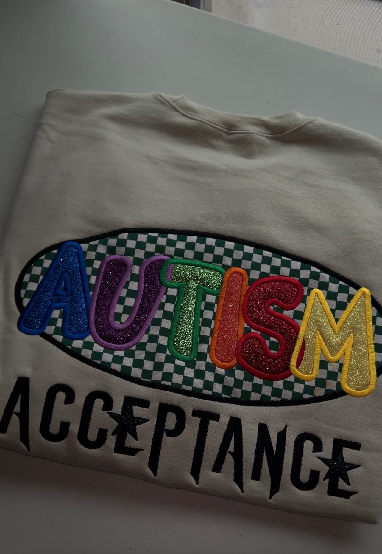 Autism Acceptance checkered sparkle crewneck