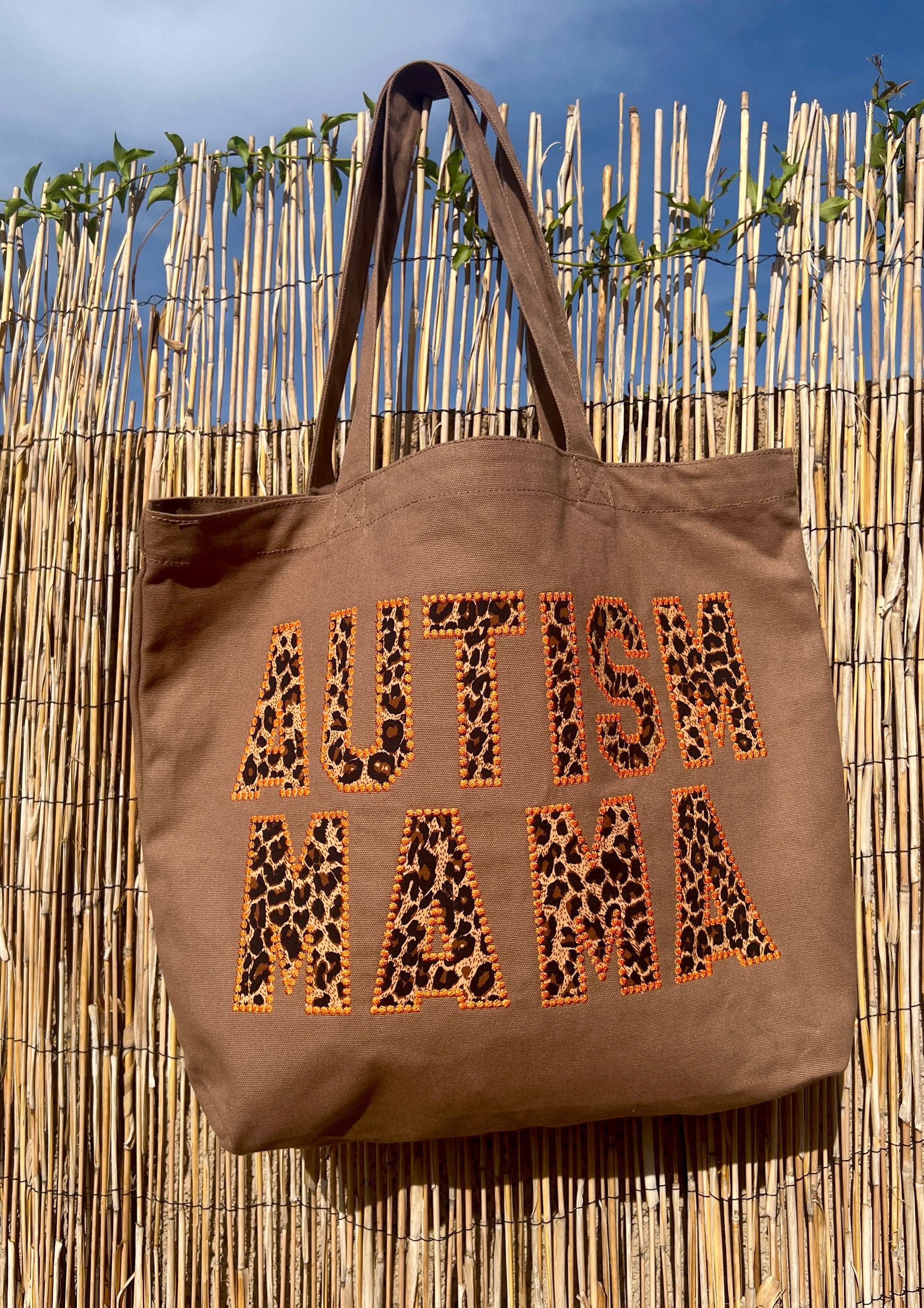 Cheetah embroidered tote bag